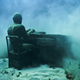 Illustration for article titled The Astonishing Treasures of Underwater Art Galleries